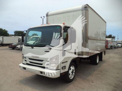 Isuzu NPR HD box truck showing side profile and front cab with cargo box in a dealership lot.