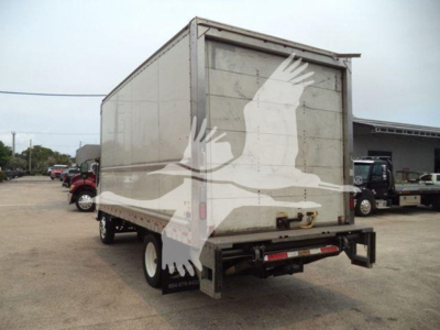 Isuzu NPR-HD box truck rear view showing cargo box and rear bumper.