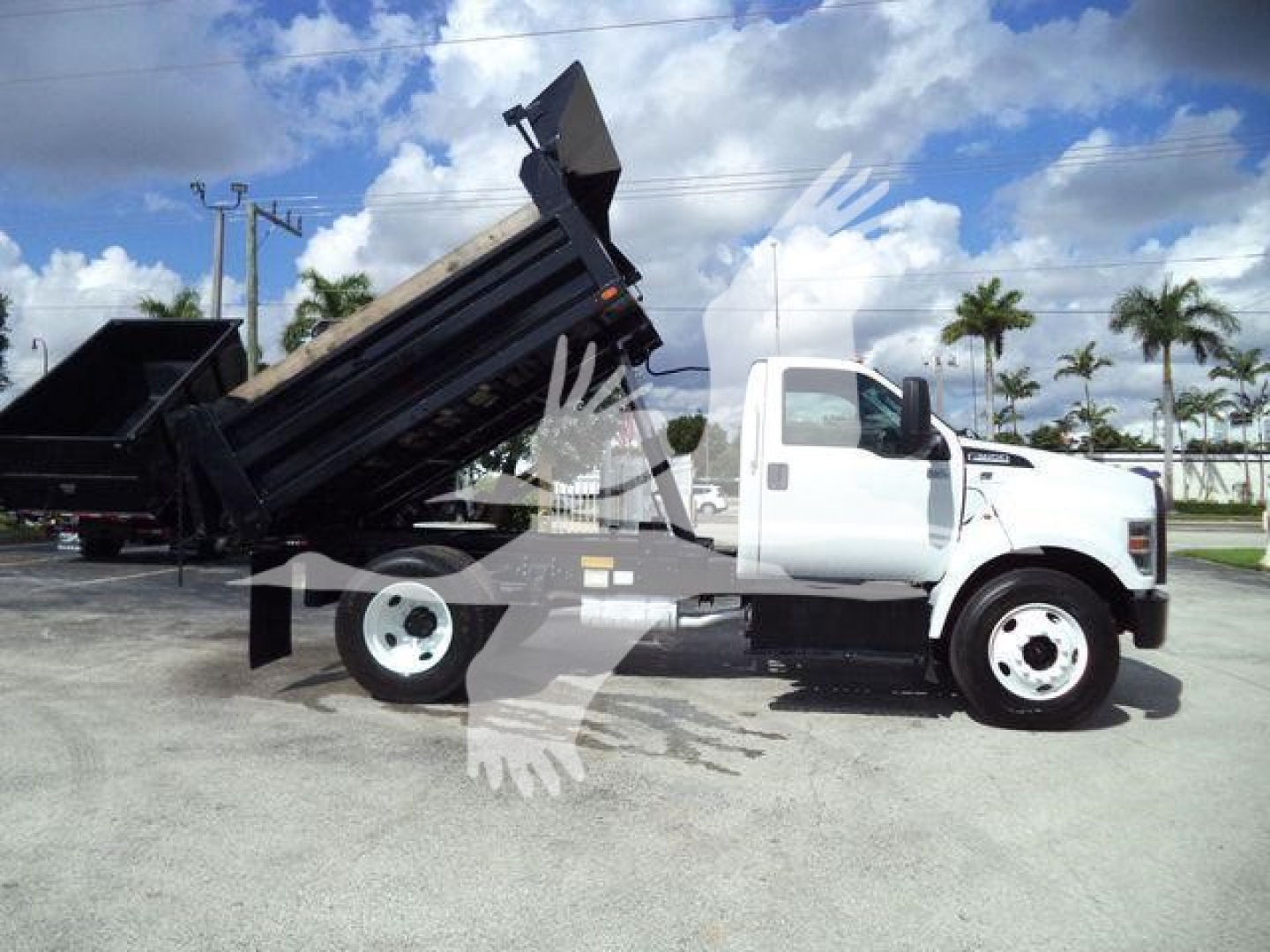 Truck bed raised dump body on a 2017 Ford F650 XL SD in a dealership lot