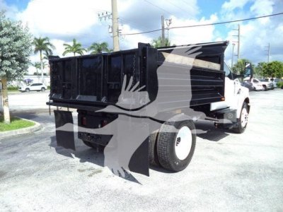 Dump truck bed of a 2017 Ford F650 XL SD viewed from rear-left side showing dump bed and rear tires.