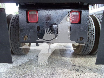 Truck rear view showing hitch area and dual rear lights of a 2017 Ford F650 XL SD dump truck. Visible are taillights, bumper plate, and rear wheel wells.