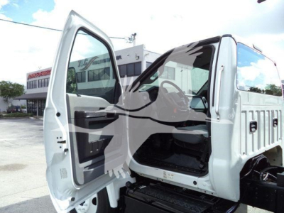 Ford F650 XL SD truck cab and door open showing interior and step area.