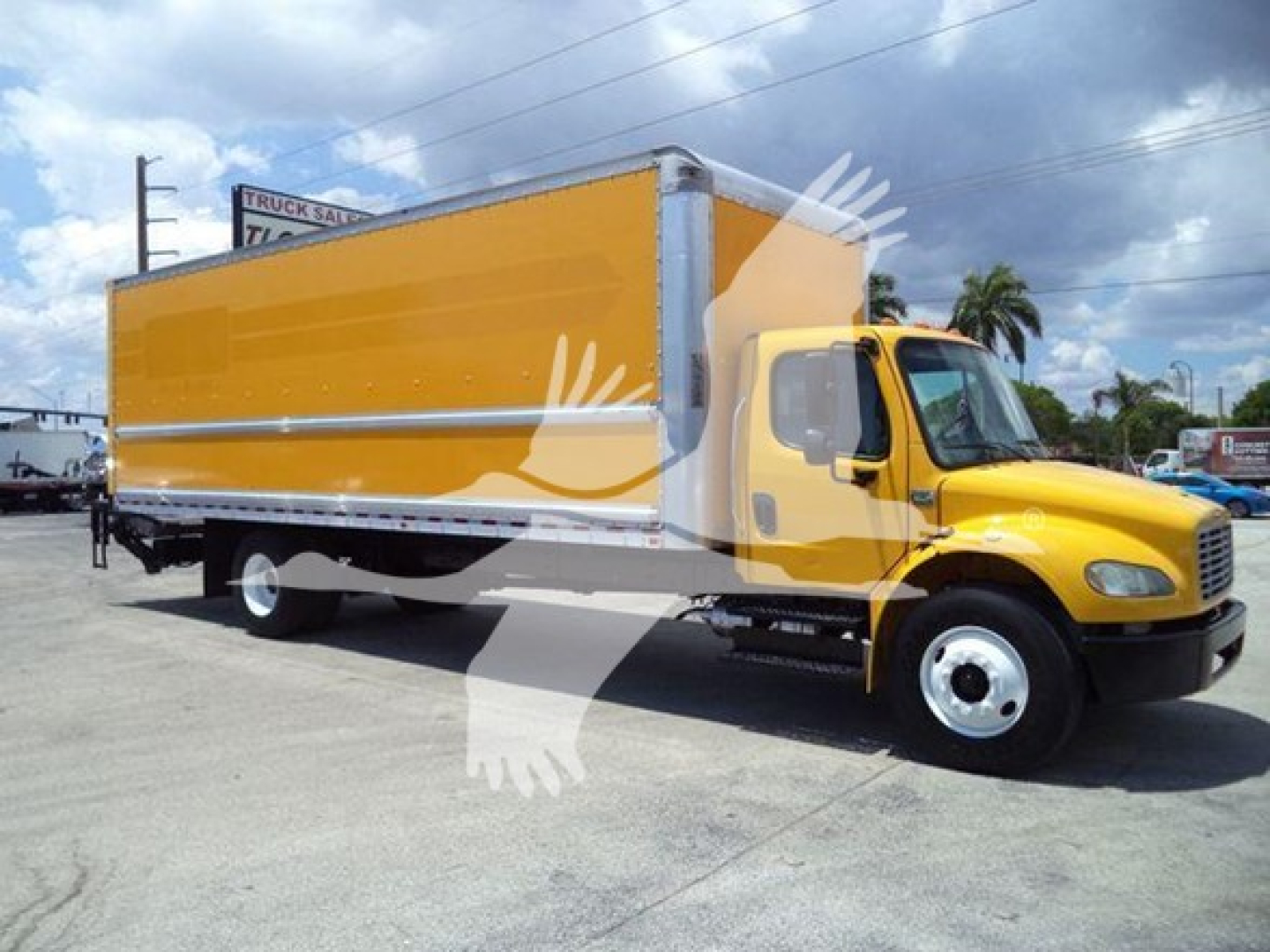 Box truck with yellow cab and large yellow box body, Freightliner M2 106 style, side view.