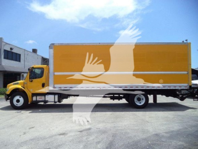Freightliner M2 106 box truck with yellow cab and orange box seen in side profile.