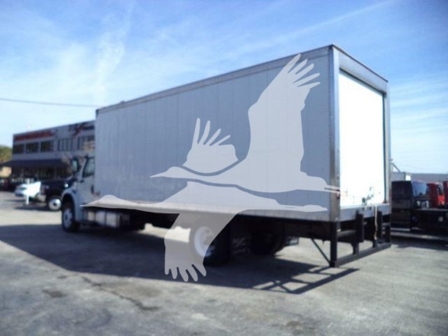 Freightliner M2 106 refrigerated box truck showing side with logo; stock number 24016R, VIN 3ALACXCY1GDHN4359, category Refrigerated, used.