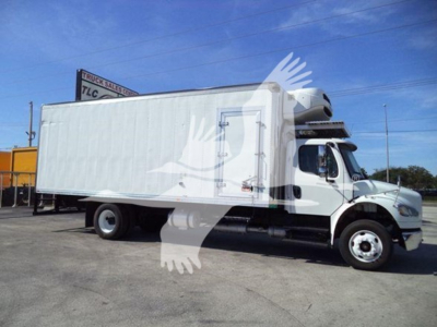 Freightliner Business Class M2 106 refrigerated truck side view showing cargo box and cab, white exterior.