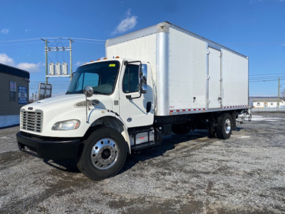 Box truck: 2019 Freightliner M2 106 box truck with white cab and large white cargo box, side view showing dual rear wheels, chrome mirrors, and front grille.