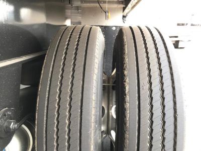 Utility 4000AE trailer twin rear wheels with tread details visible.