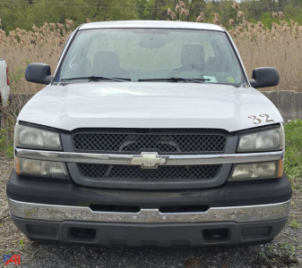 Front view of 2005 Chevrolet Silverado 1500 pickup truck, 2WD, white, with chrome grille and bumper, and black lower trim.