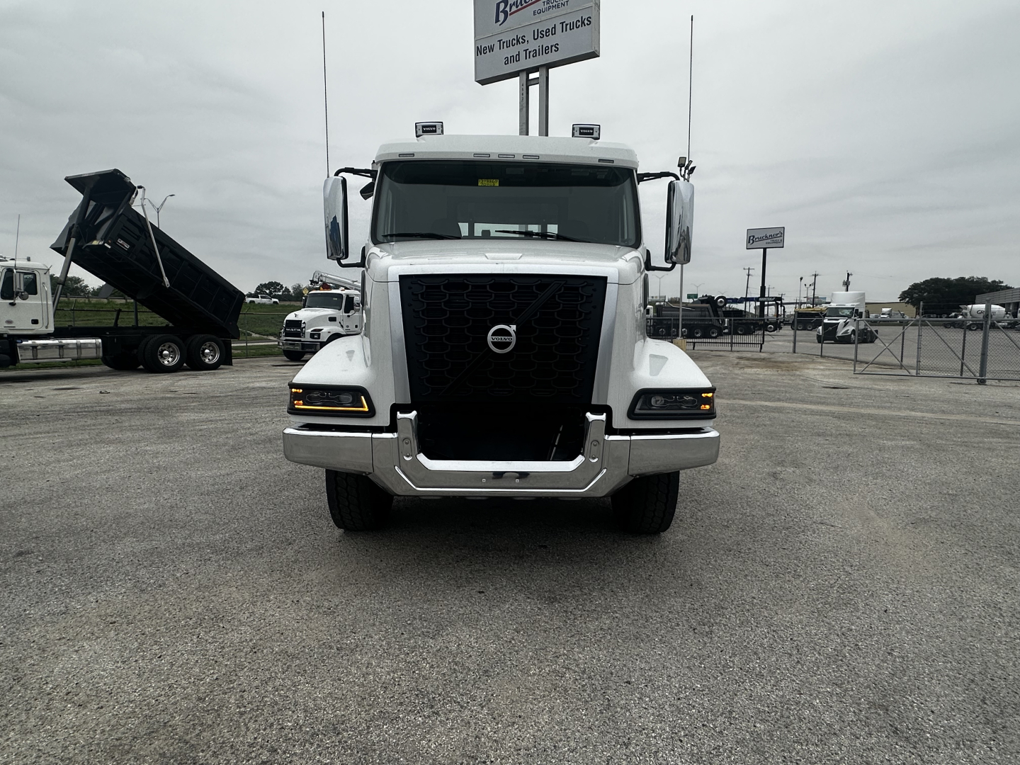 Front view of a 2026 Volvo VHD64B300 truck showing bold grille and headlights.