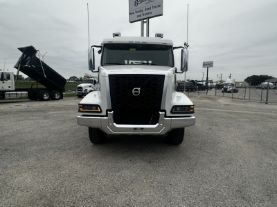Front view of a 2026 Volvo VHD64B300 truck showing bold grille and headlights.