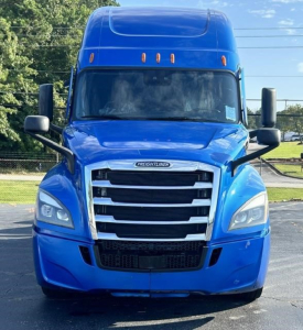 Front view of a blue 2022 Freightliner Cascadia 126 tractor, showing grille, headlights, and large windshield.