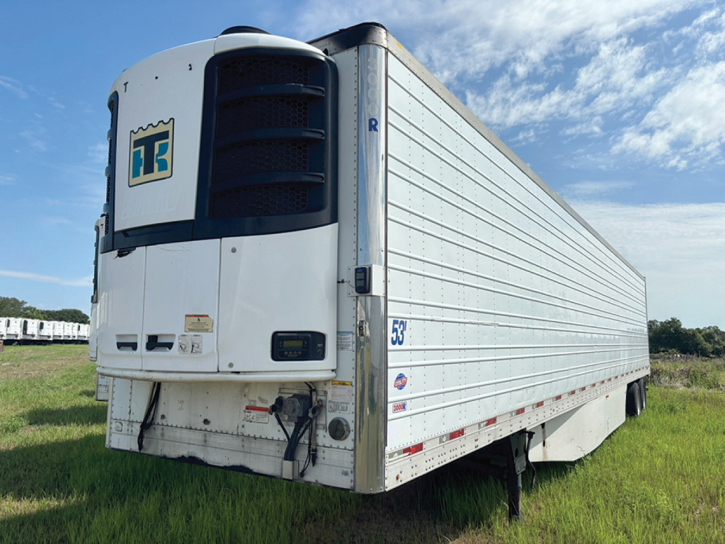 Rear left view of a white 2016 Utility 3000R refrigerated trailer showing a large cooling unit on front corner and raised sides.