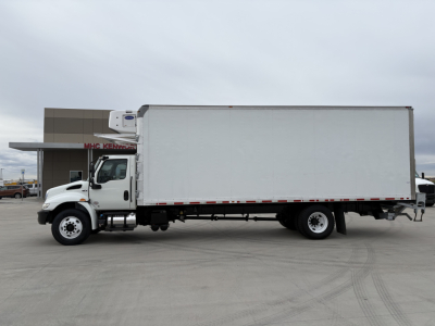 International MV607 refrigerated truck side view showing cargo box and cab details