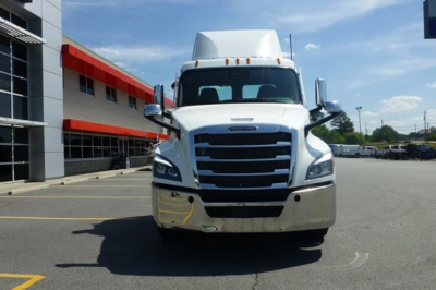 Front view of a white 2027 Freightliner Cascadia 126 day cab truck showing chrome grille, headlights, and bumper.