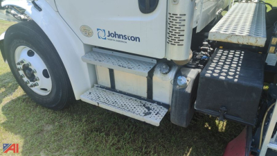 Freightliner M2 106 sweeper/vac truck side view showing steps, door, Johnson North America logo, and crew cab area.