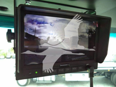 Peterbilt 536 rollback truck interior monitor screen displaying rear camera feed and controls.