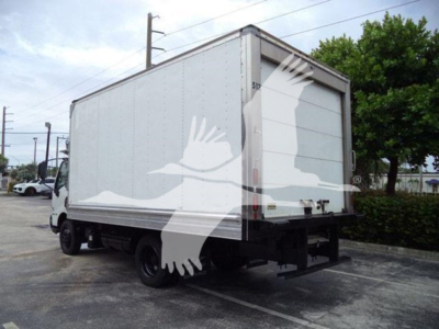 Refrigerated box truck labeled 2020 Hino 195, side rear view showing cargo box and rear doors.