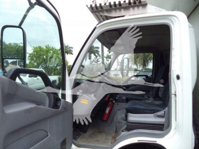 Cab interior of a 2020 Hino 195 refrigerated truck with open driver door showing seat, dashboard, and floor; visible VIN and stock context not on the image but listing text nearby.