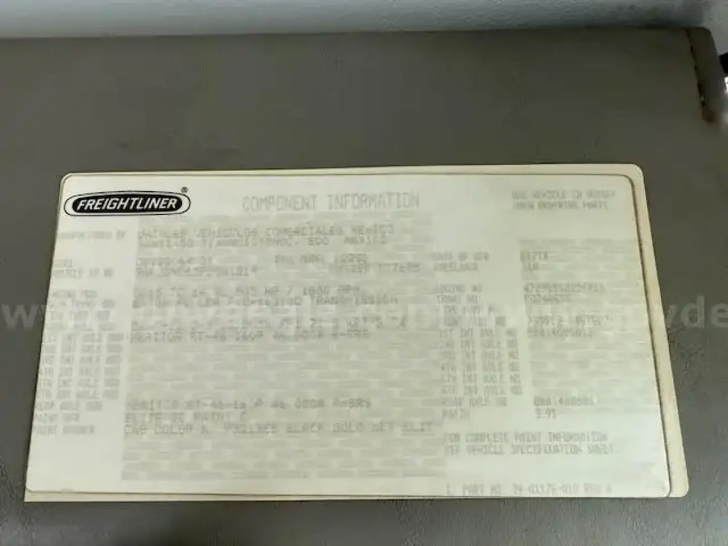 Freightliner Coronado component information plate with dense text and specs visible on label