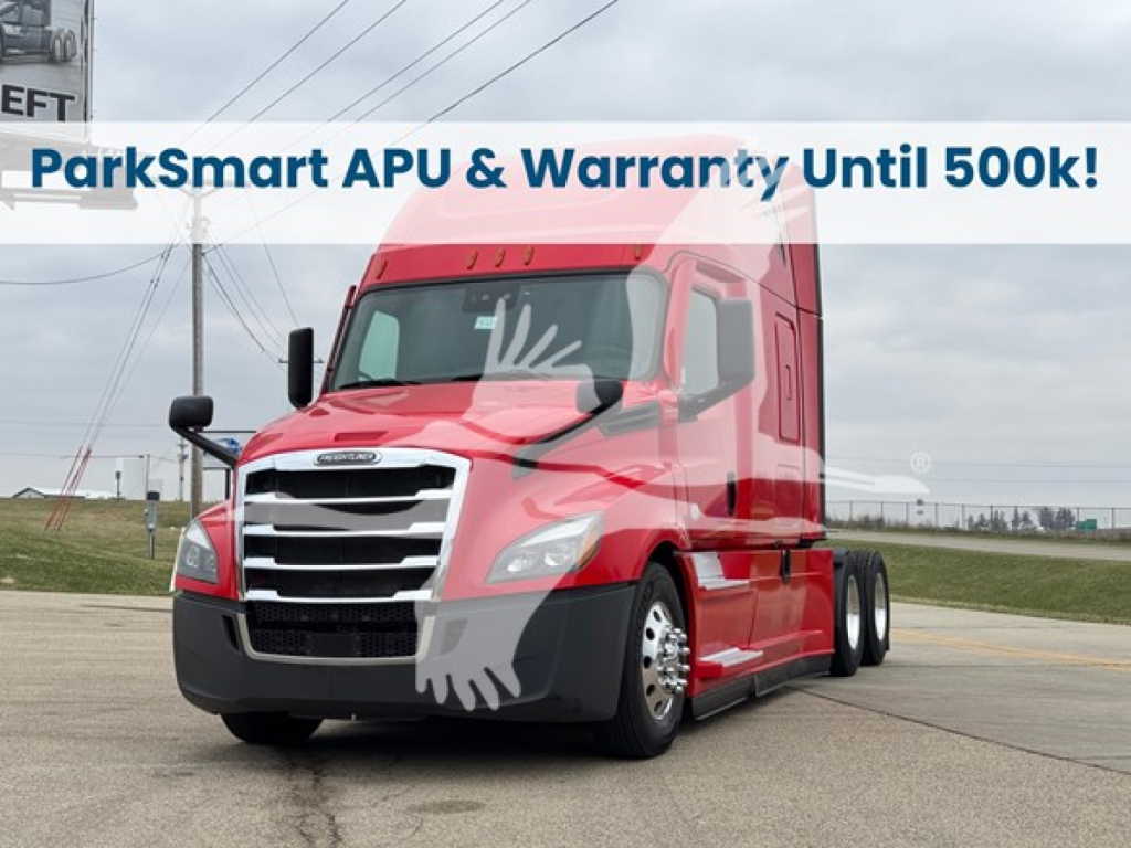 2023 Freightliner Cascadia 126 tractor cab with ParkSmart APU banner across the windshield, red color, side view showing front grille and headlights.