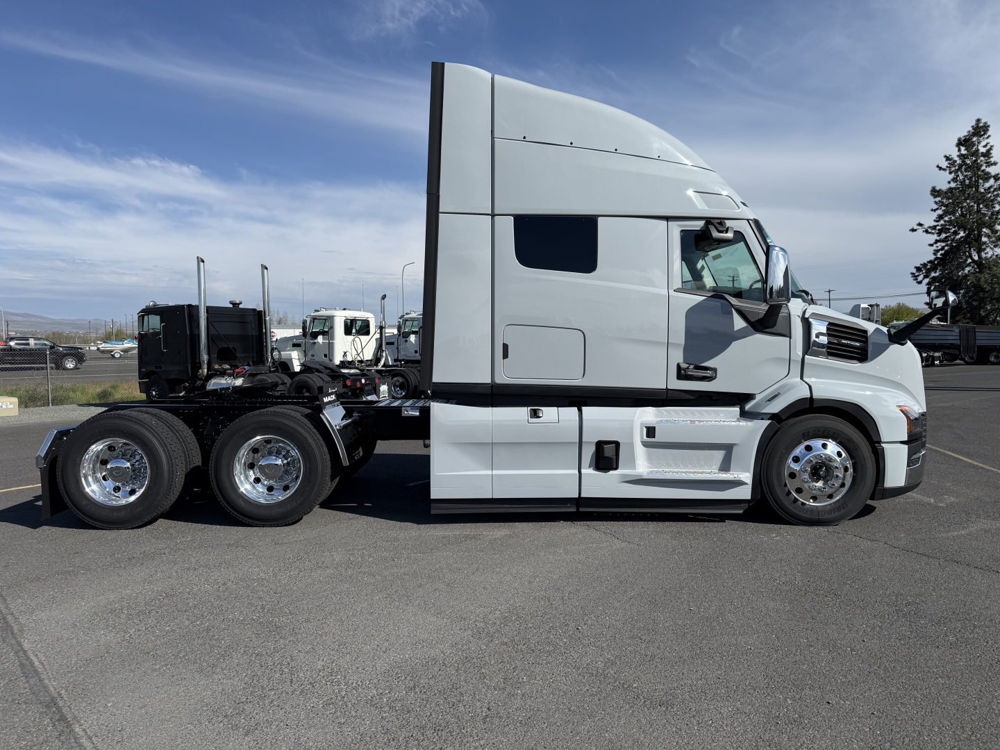 2027 Mack AN64T64 conventional sleeper truck side view showing cab, wheels, and chassis with sleepered rear axle configuration.