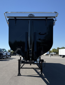 Armor Lite 40' x 78" scrap trailer front view showing dump body and hitch with support legs.