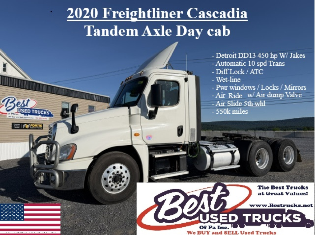 Freightliner Cascadia 125DC tandem axle day cab truck side view showing 2020 model with white cab and dual rear axles.