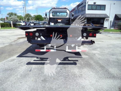 Back view of a 2020 Peterbilt 337 rollback truck showing rear bumper and hitch with taillights.