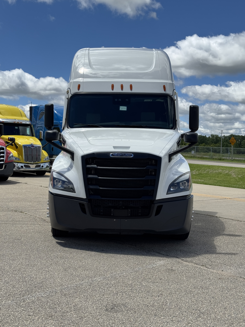 Freightliner Cascadia 126 front view showing grille and headlights.
