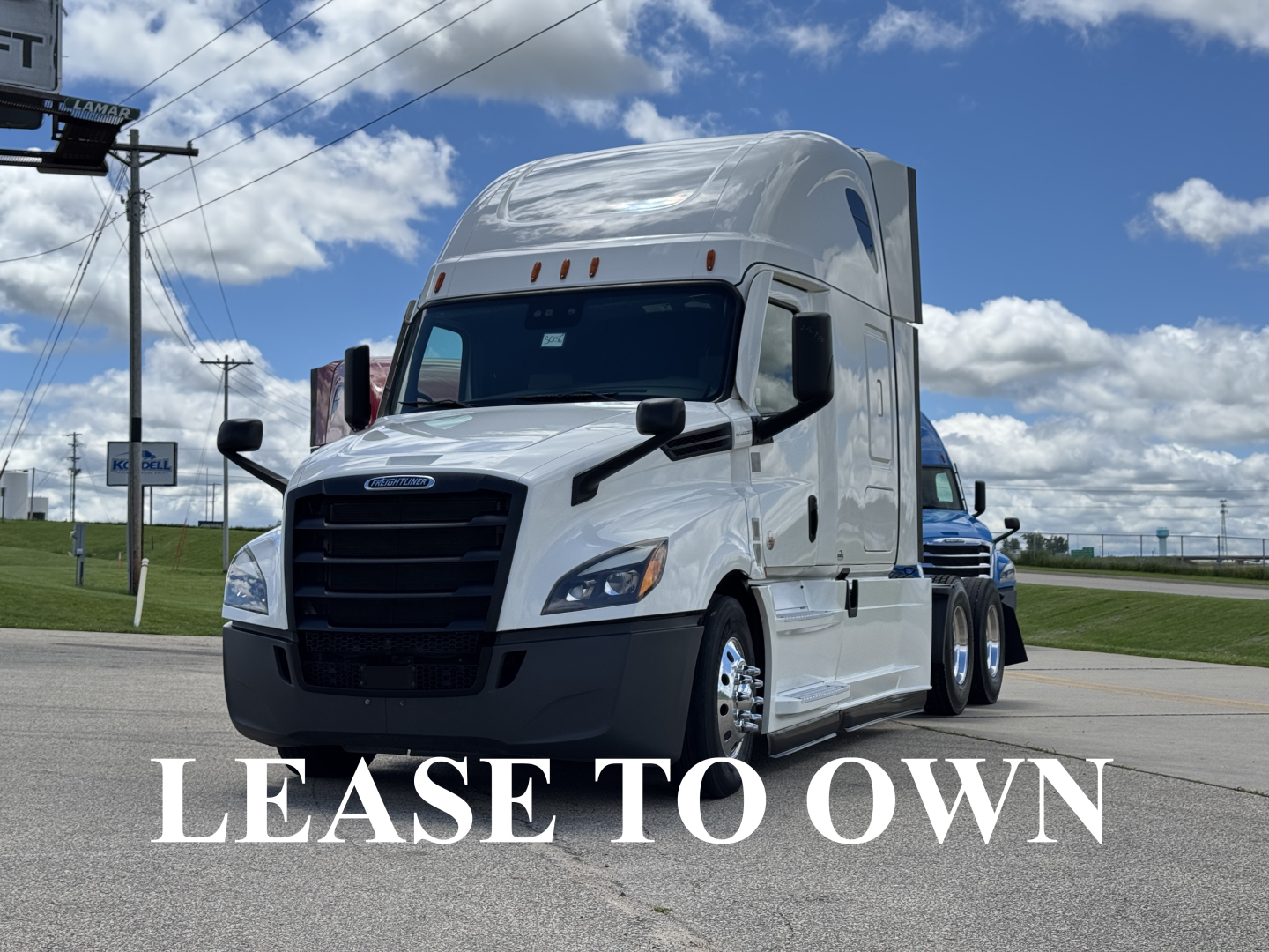 Freightliner Cascadia 126 tractor in white, front view, with ‘LEASE TO OWN’ overlay text across the lower portion.