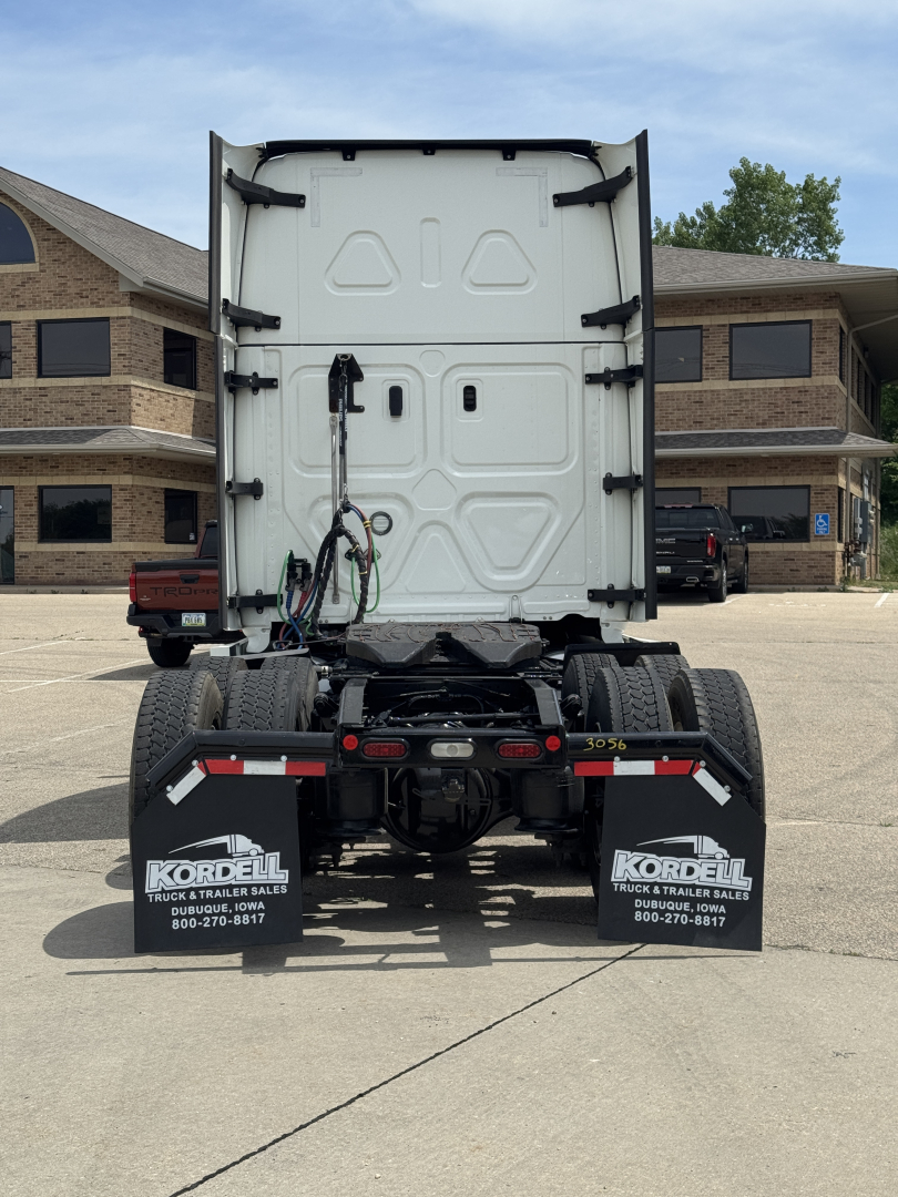 Rear view of a Freightliner Cascadia truck chassis showing the back of the cab and mud flaps with Kordell logos.