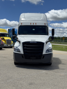 Freightliner Cascadia 126 front view showing grille and headlights.