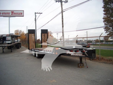 Trailer: 2026 Eager Beaver 20Xpt flatbed trailer showing dual ramps and stake pockets, yard with chain-link fence.