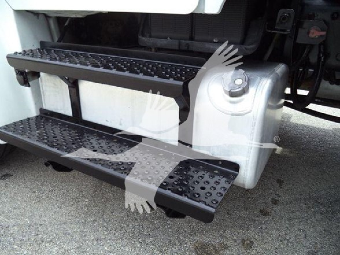 Freightliner M2 106 step/entry stairs and front bumper area visible