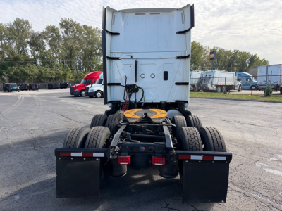 Truck rear view showing fifth wheel and dual rear axles for a 2021 International LT625.