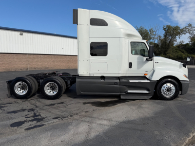 International LT625 truck tractor side view showing sleeper cab and chassis with 6x4 axle configuration.