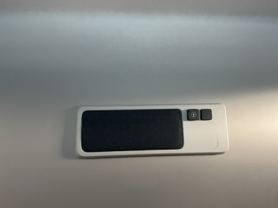 Volvo VNL64T860 interior overhead console with sunshade and small control buttons.
