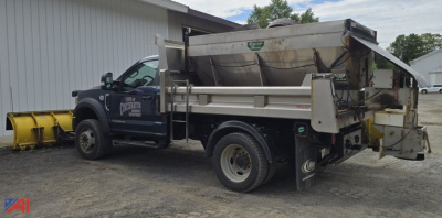 Ford F-550 Super Duty dual rear wheel dump truck showing bed and heavy-duty rear apparatus.