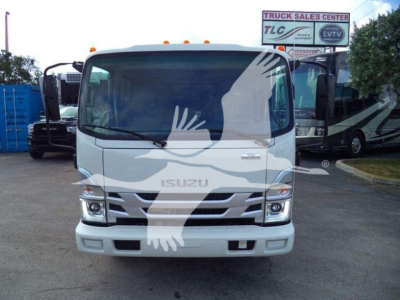 Isuzu NPR HD dump truck front view showing blank grille and windshield, Stock NPRCREWDUMP2 shown in dealership lot.