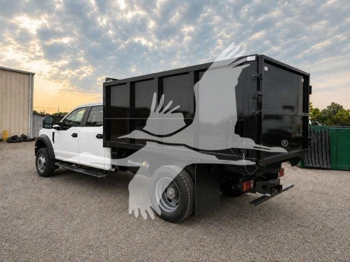 2020 Ford F450 XL dual-tone pickup with black dump bed, side view showing rear and cargo bed.