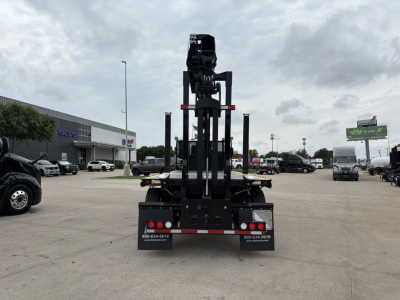 Rear view of a Mack crane truck with a mounted crane on a flatbed. Visible text on rear bumper panels and truck includes phone numbers and small labels. Stock number 71411 not visible on image.