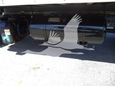 Hino 195 undercarriage showing fuel tank and battery box along with chassis; cylindrical fuel tank with reflections visible.