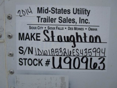 Sign on trailer indicating 2014 Mid-States Utility Trailer Sales, Inc. Make Stoughton; S/N U090963; Stock U90963; VIN 1DW1A5326ES435994; stock number visible on plate.