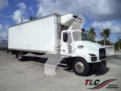 Mack MD6 refrigerated truck in side view showing cab and cargo box with refrigeration unit on top.