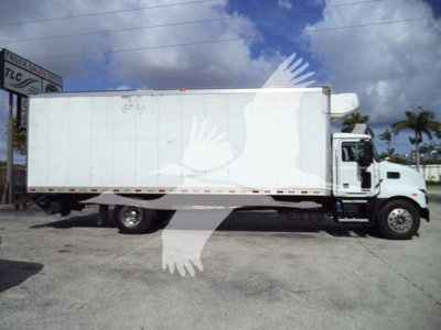 Mack MD6 refrigerated truck side view showing cargo box and cab, VIN 1M2MDBAA2PS006384, stock 268303R.