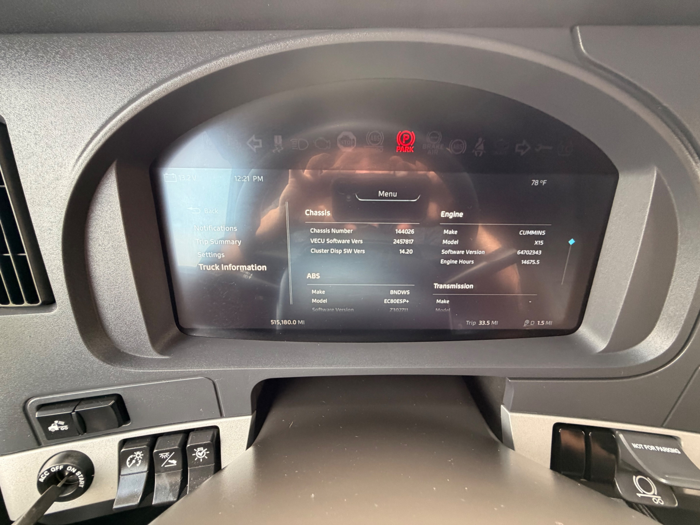 Kenworth T680 dashboard display showing truck information menu with engine status, ABS, transmission, and various system readouts.