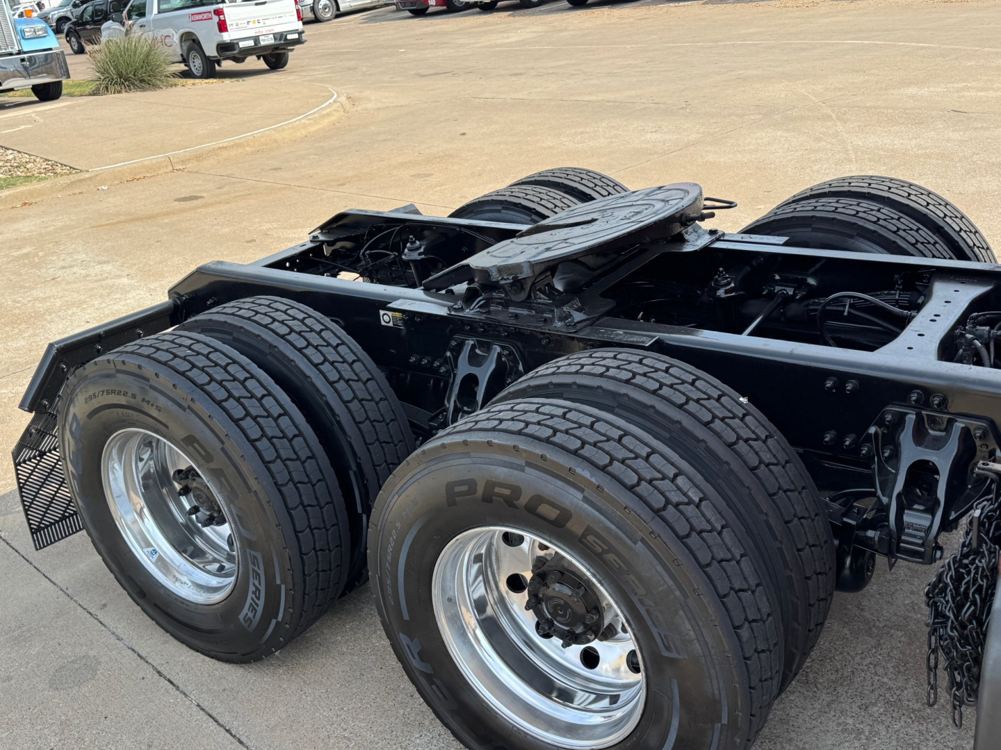 Kenworth T680 rear chassis with dual rear axles and tires visible