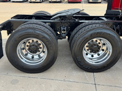 Kenworth T680 rear wheel assembly showing dual rear tires and chassis framing.