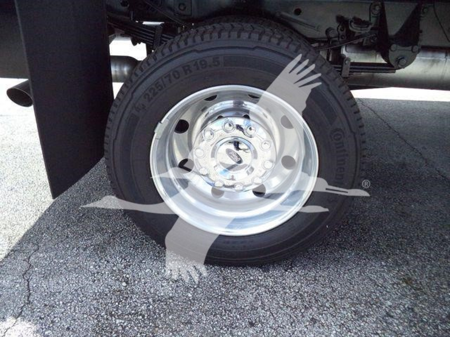 Ford F-550 wheel and tire assembly with steel rim and tire stamp showing 225/70R19.5 label.